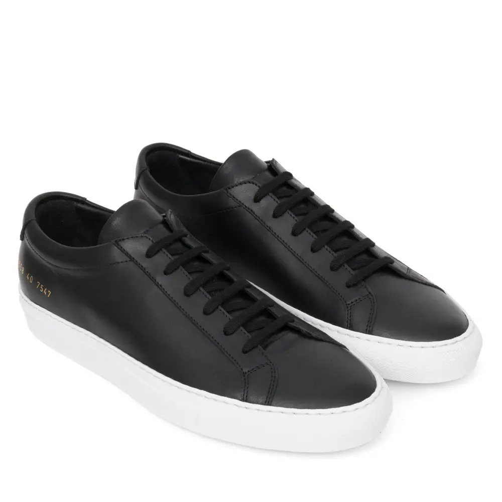 having trouble finding a stylish black/dark sneaker with white soles ...